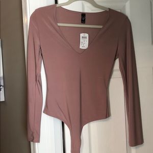 Mauve body suit - never worn